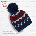 Cuffia jacquard con pompon ai ferri in Super Otto – schema PDF